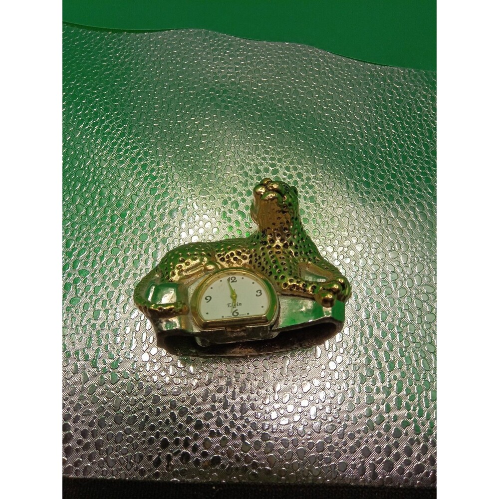 Elgin clock gold leopard design